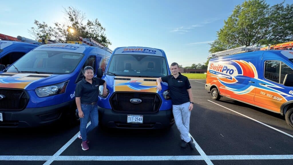 SwiftPro technicians and vans representing local, family-owned Northern Virginia heating, cooling, and plumbing services.
