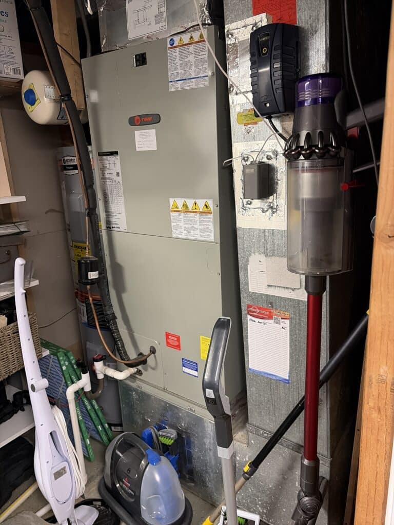HVAC emergency repair: furnace and ductwork in Northern Virginia basement.