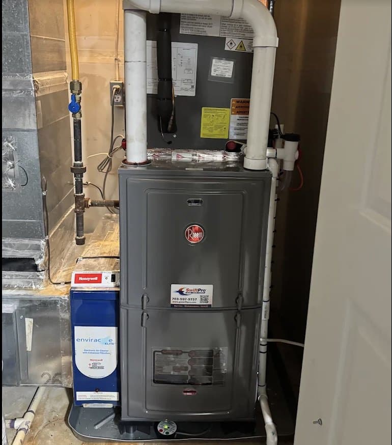 A Rheem furnace installed by SwiftPro in the utility room of a Northern Virginia home