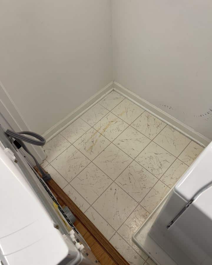 The same Ashburn laundry room floor after the SwiftPro dryer vent cleaning