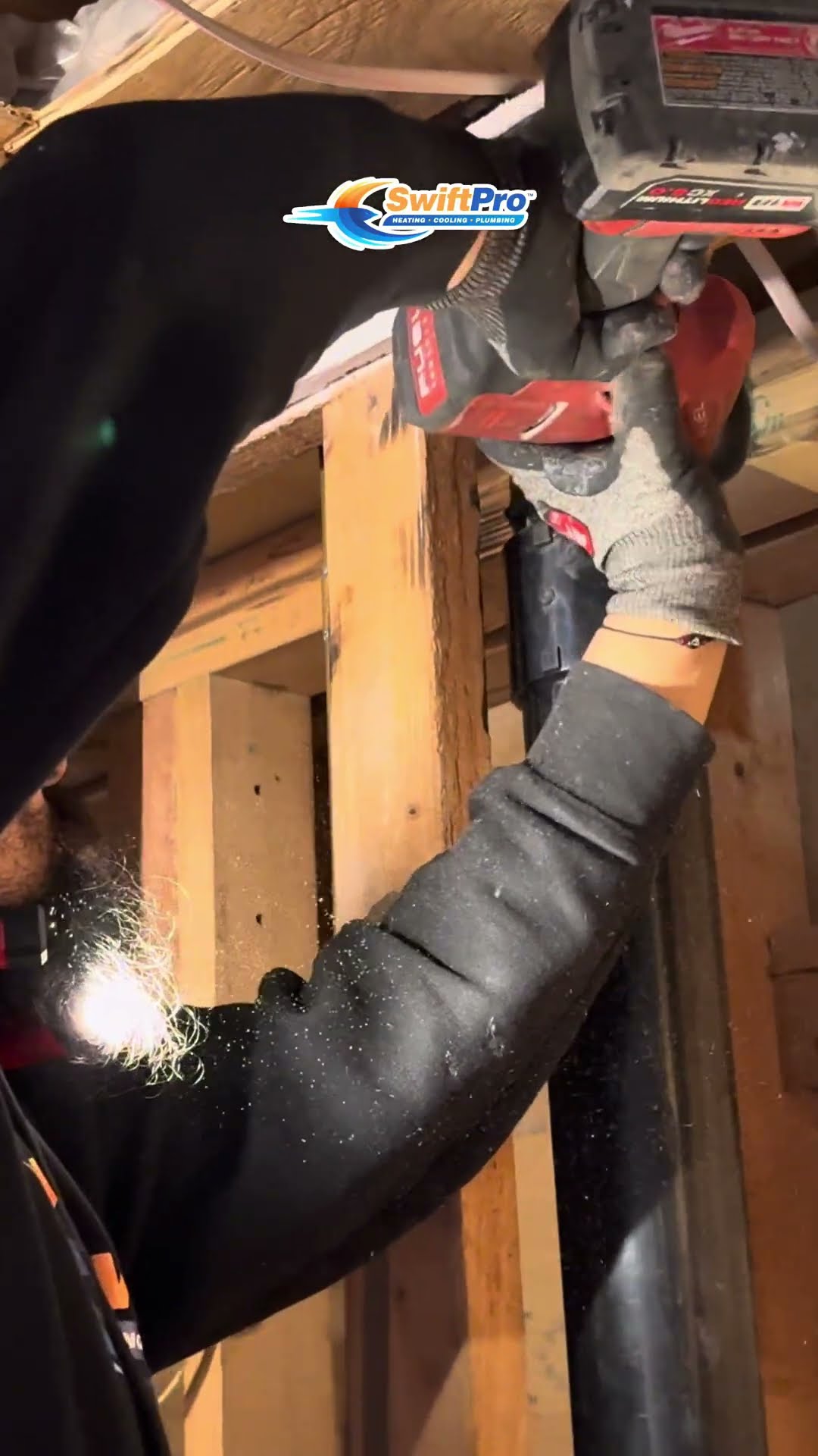 Copper pipe replacement in a basement: a tech fits new copper water lines overhead, then cuts old pipe with a Milwaukee saw throwing sparks, near a water heater area.