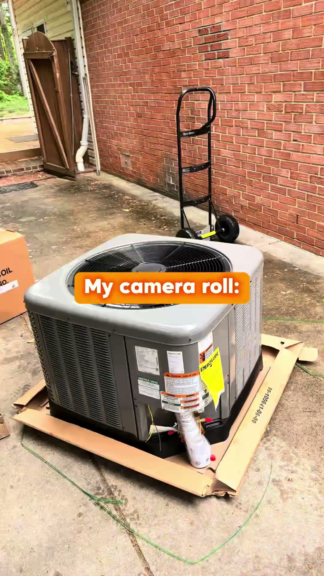 Meme about a full camera roll: a new AC condenser on a driveway beside a brick house with a hand truck, the owner sweating in the sun in a close-up selfie, and a tech in a red headlamp inspecting the