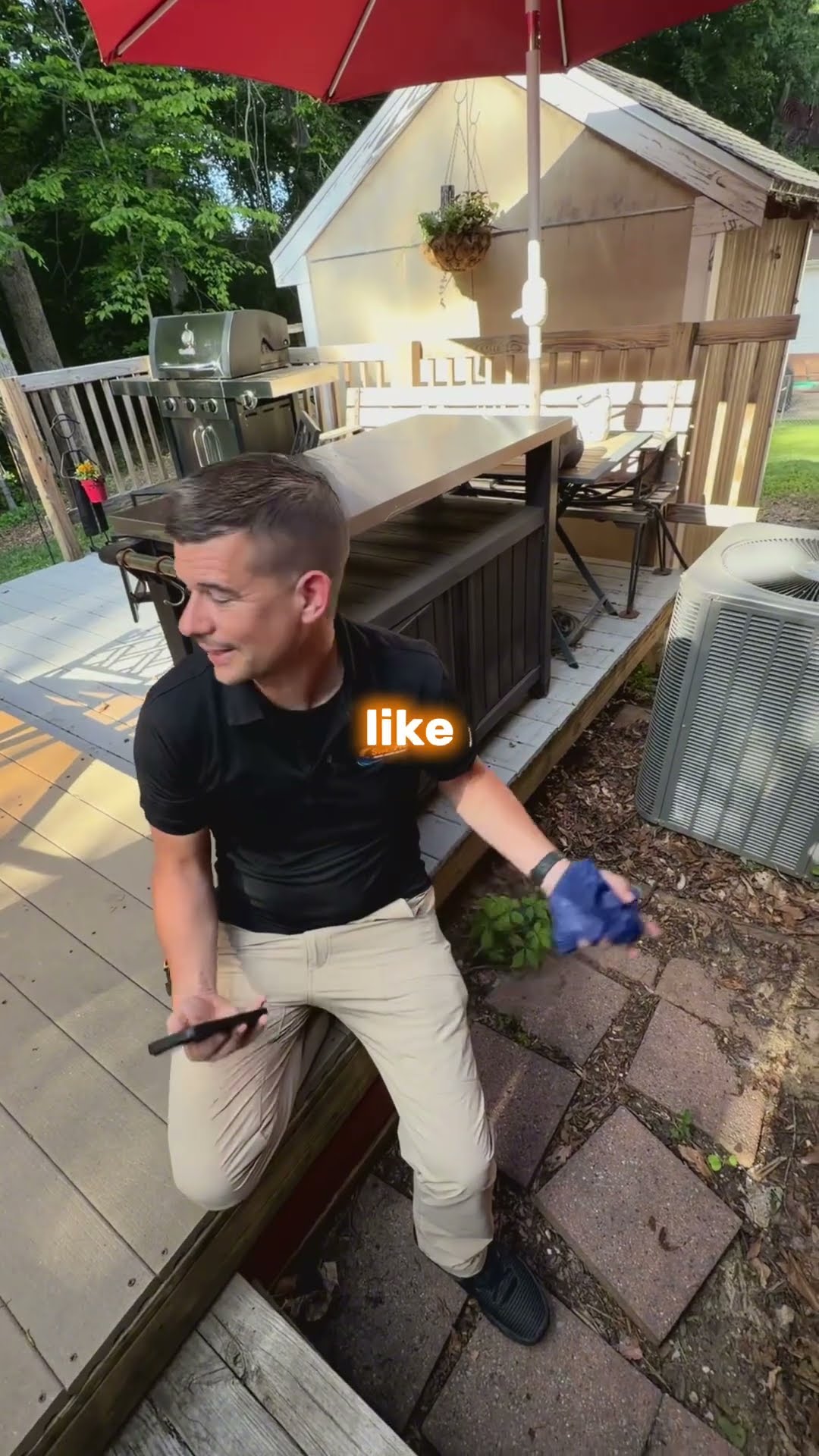 A man in a black SwiftPro polo and khakis sits on a backyard deck step beside an outdoor AC unit, holding a phone and blue gloves, talking through a home assessment, then talks from the driver's seat