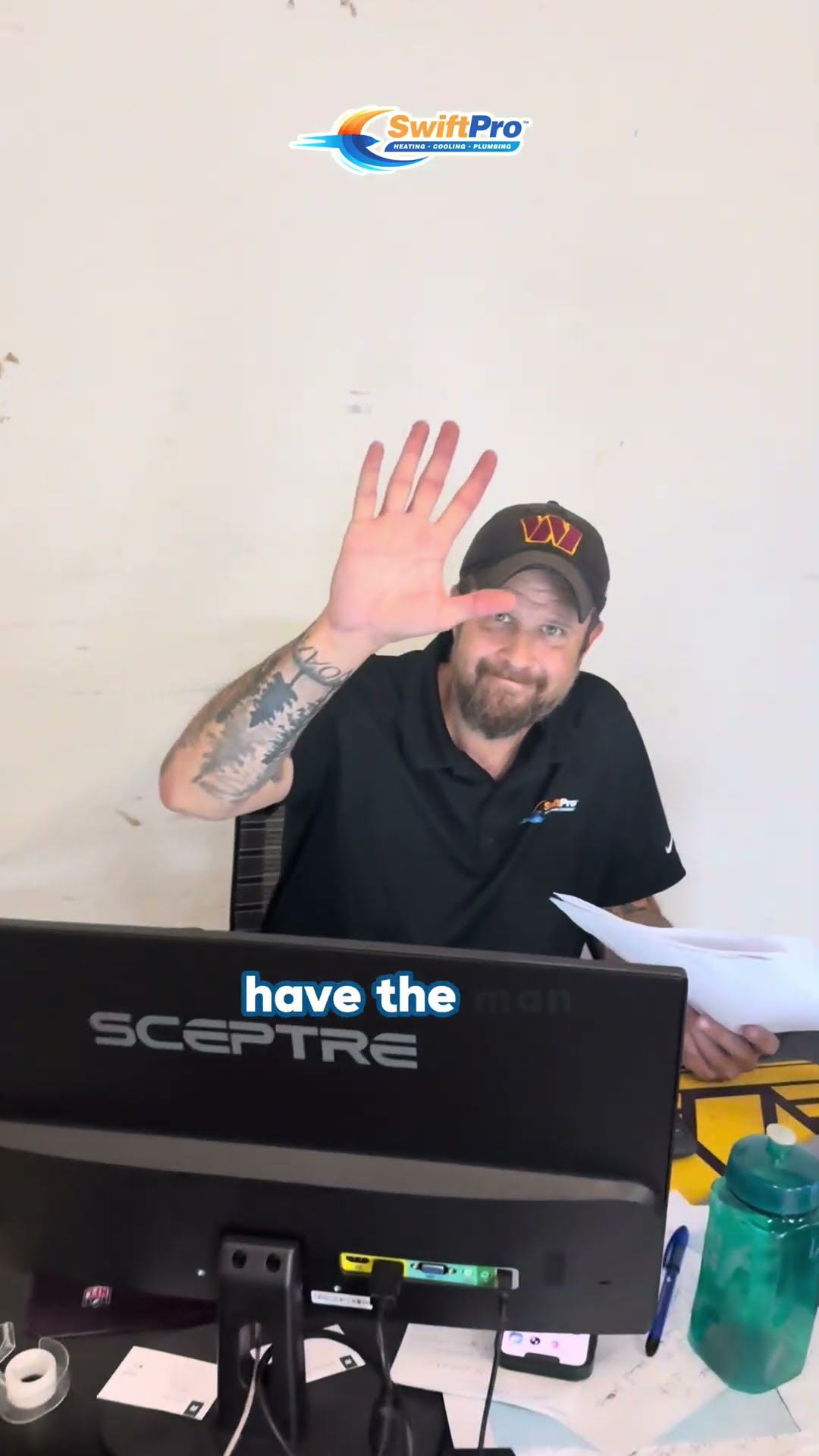 A behind-the-scenes look at the SwiftPro shop: an office staffer in a black SwiftPro polo waves from a desk, a young tech unloads an old A.O.