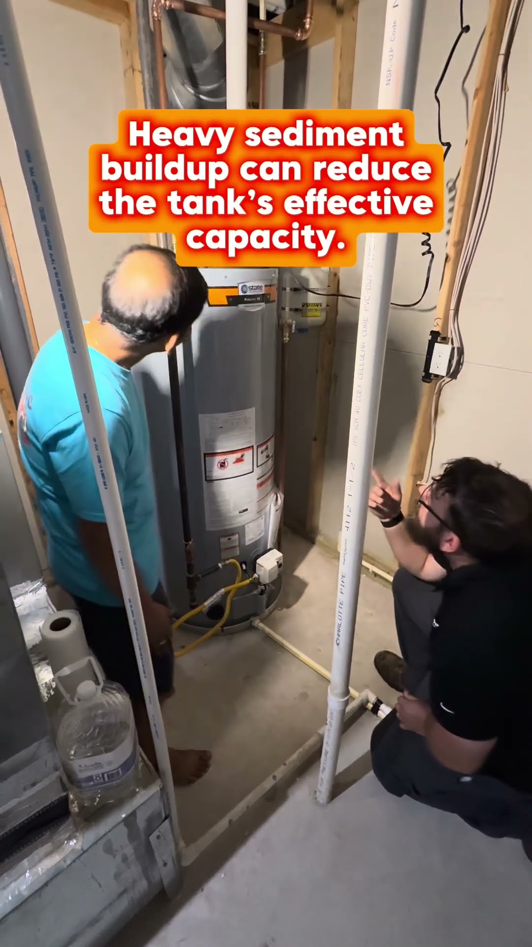 Water heater flushing explainer: a tech kneels at a GE electric water heater beside a SwiftPro van, then a tech kneels at a basement gas water heater pointing at the drain while the homeowner watches.